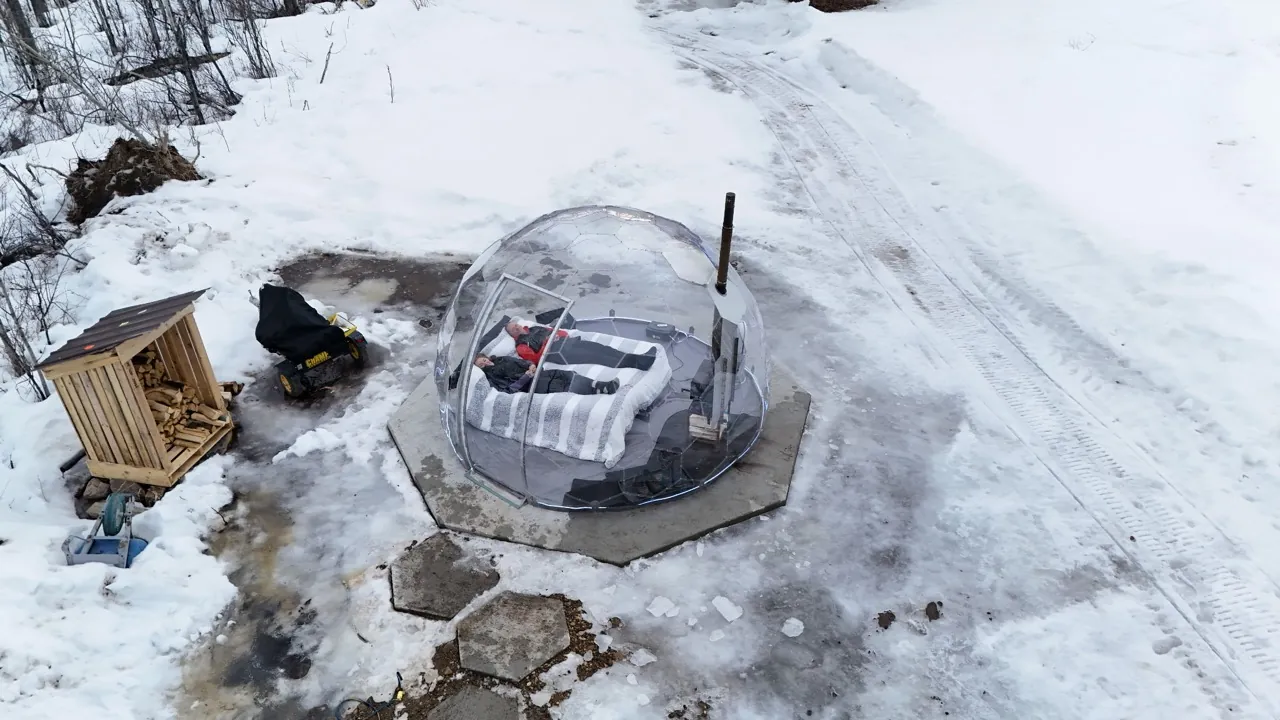 Outdoor bedroom dome in the snow