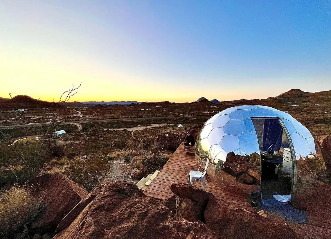 A Hypedome glamping dome in a dessert