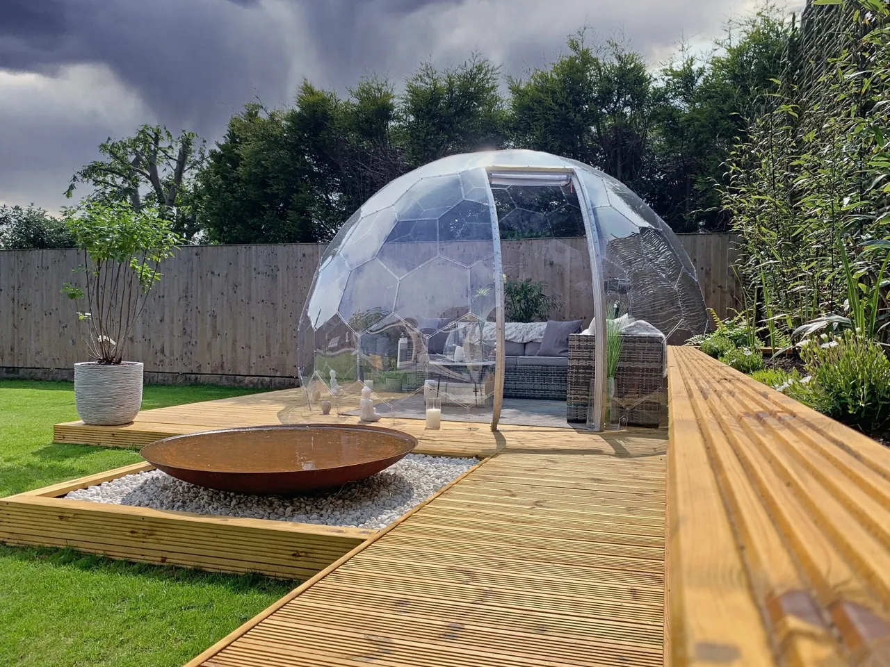 Backyard Hypedome viewed from the garden, panels catching the light