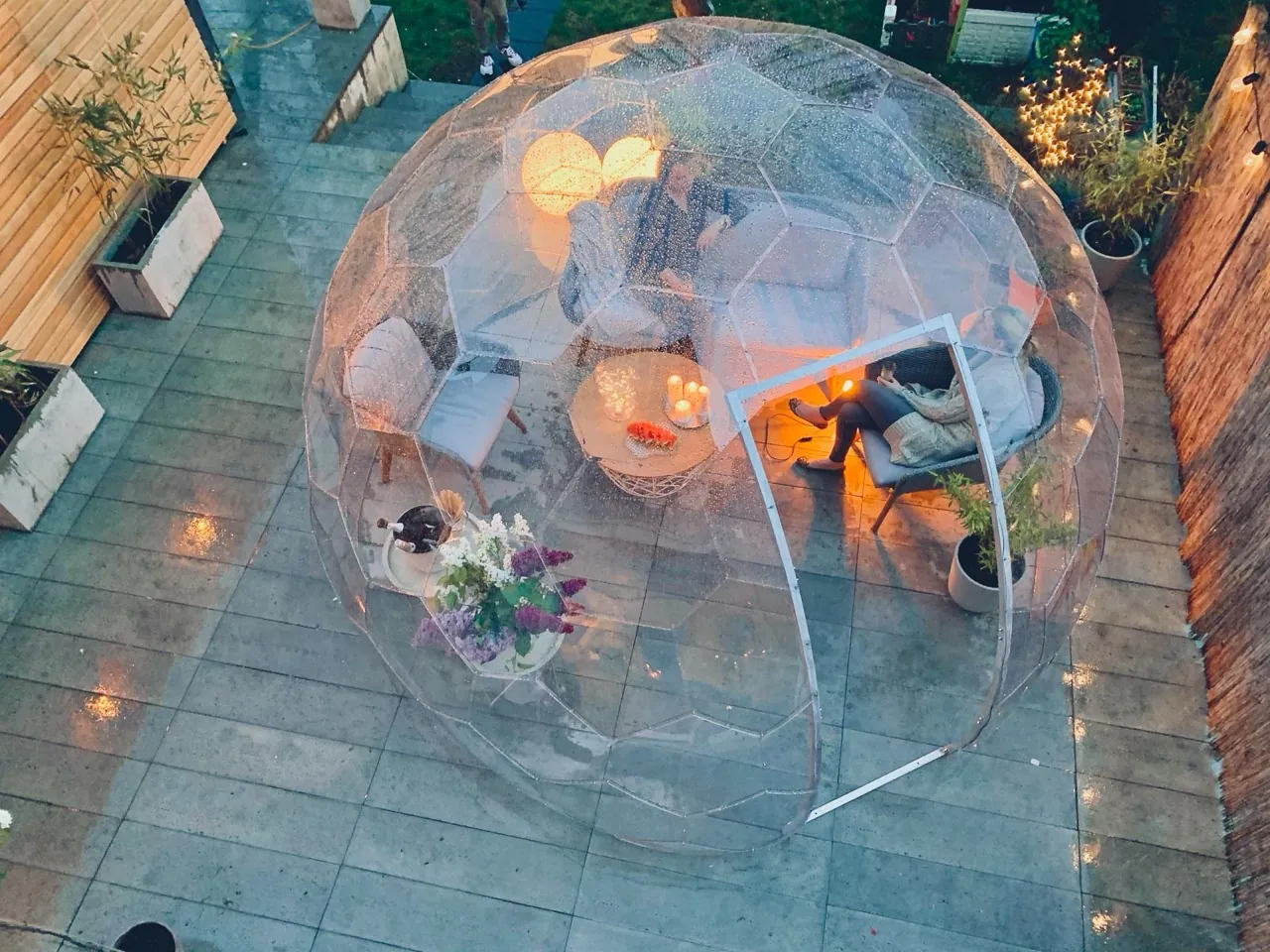 Hypedome dome surrounded by garden planting and trees