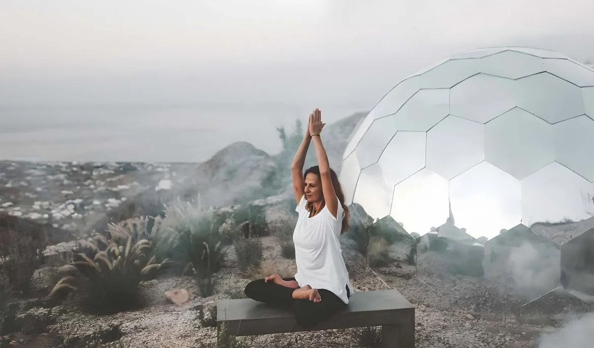 A woman meditating outside of the mindfulness room